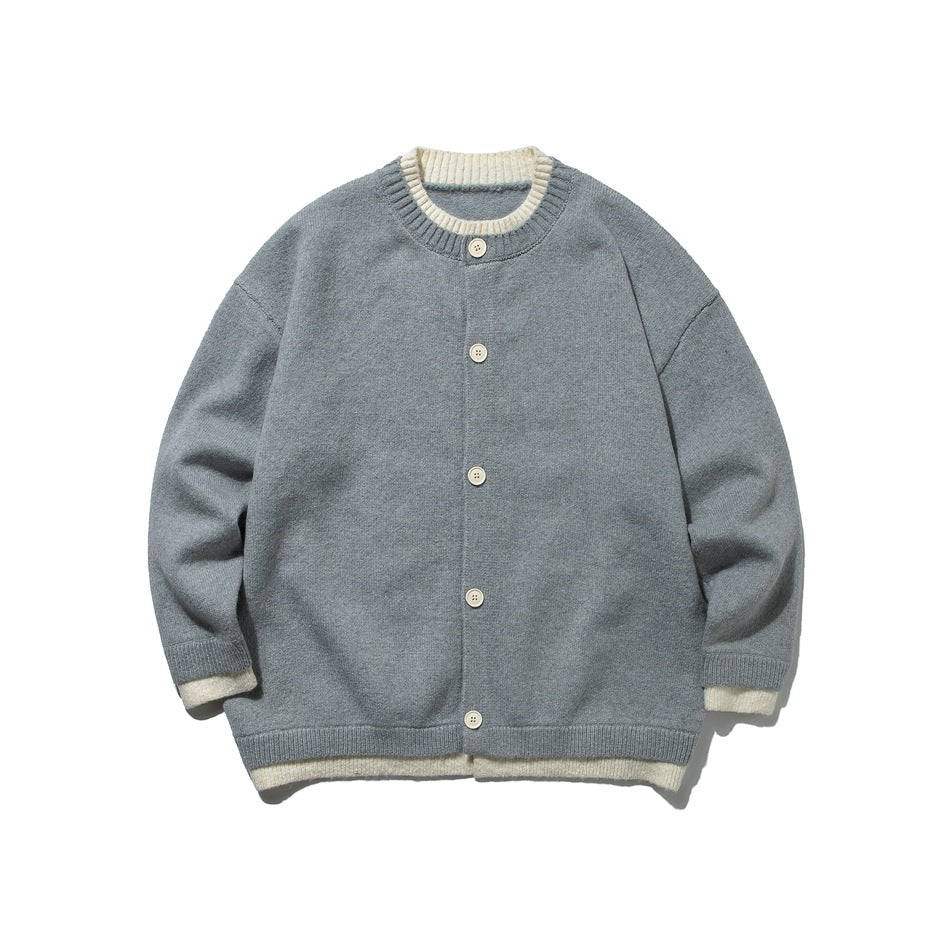 Light gray button-front knit cardigan with cream ribbed collar, cuffs and hem, flat front view