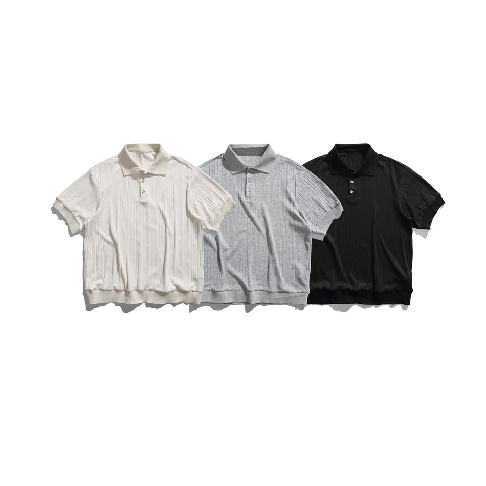 Three short-sleeve ribbed polo shirts shown from the front in ivory, light gray, and black.