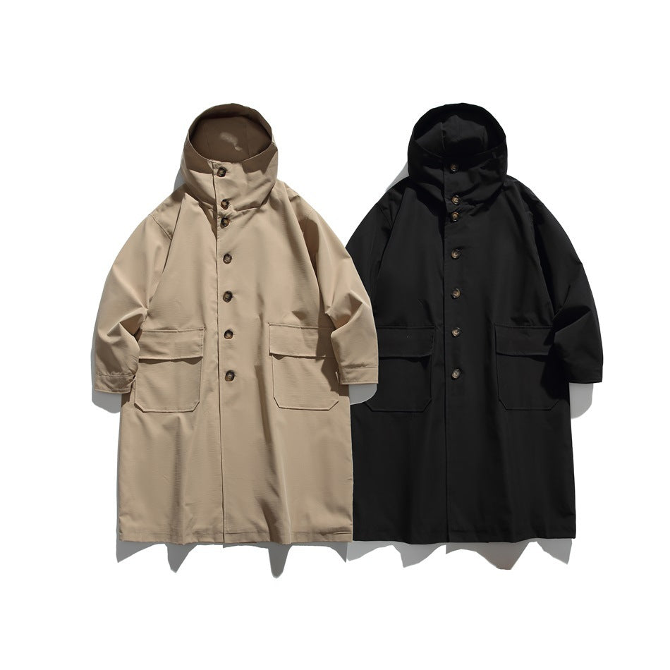 Two hooded long coats displayed front-on, one beige and one black, each with buttons and large pockets.