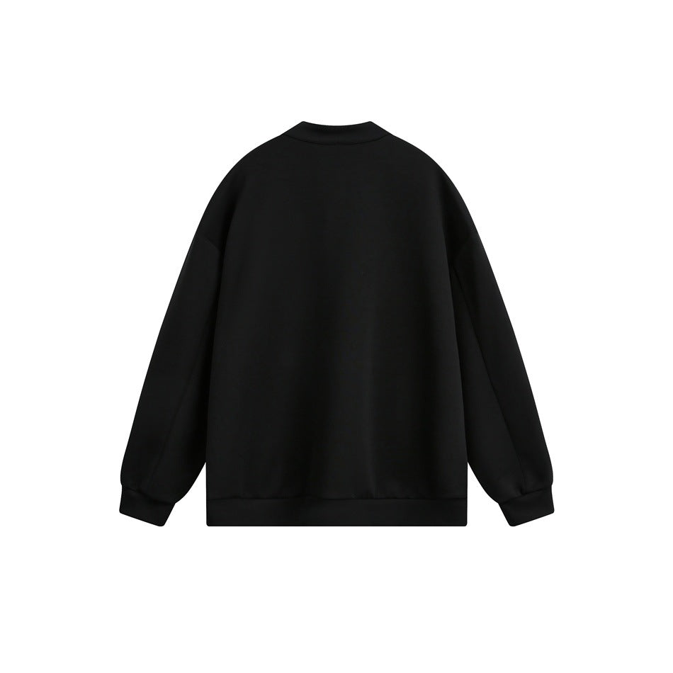 Plain black long-sleeved pullover shown from the back, with a short band collar and ribbed cuffs and hem.