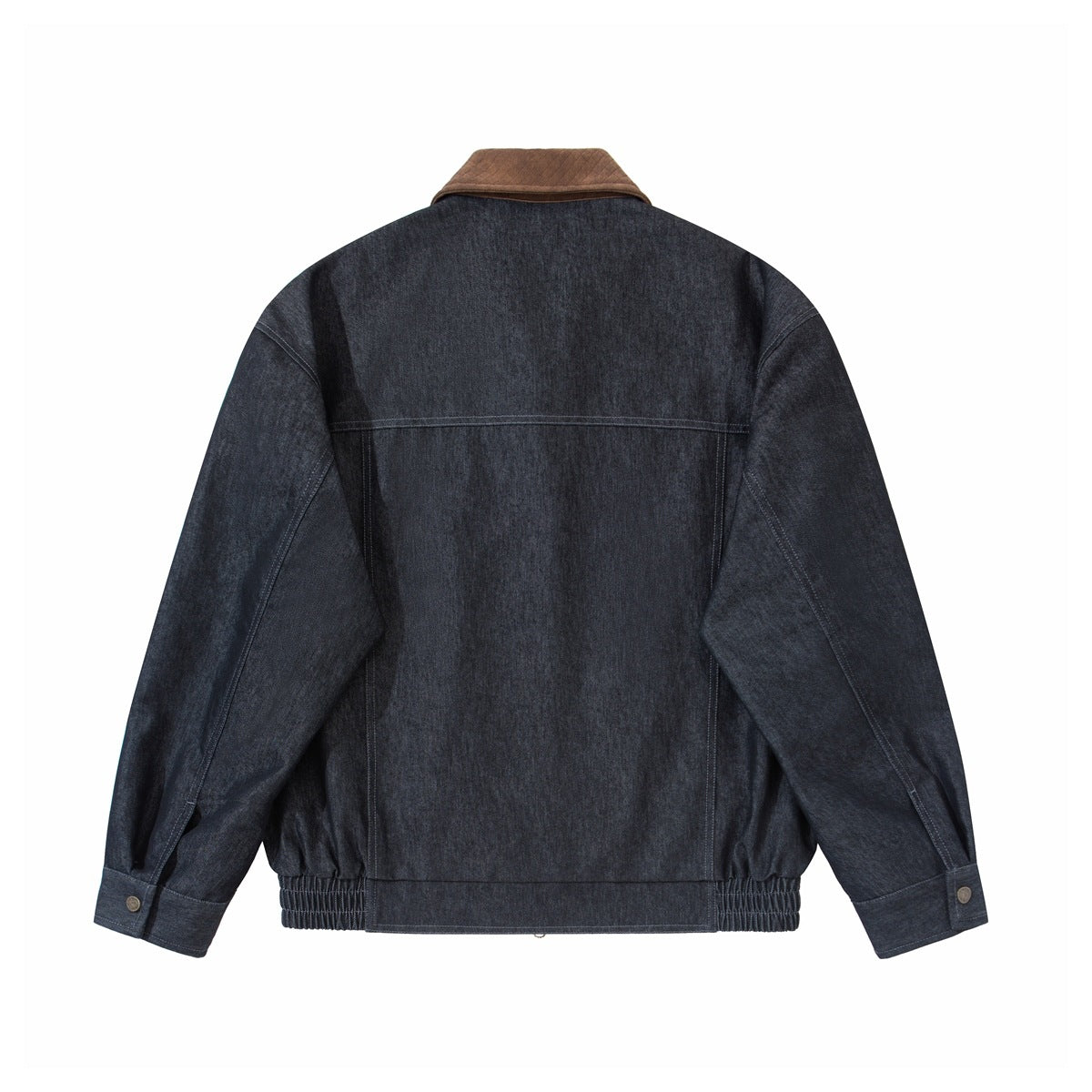 Back view of a dark indigo jacket with a brown collar, panel seams, buttoned cuffs, and an elasticated hem.