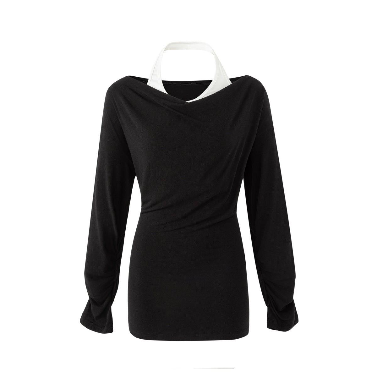 Black long-sleeve top with draped neckline, white halter-style layer, ruched waist and ruched sleeve cuffs, front view