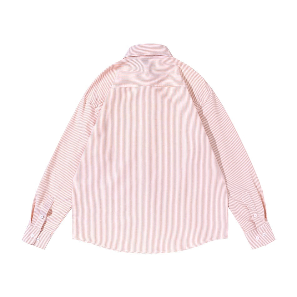 Back view of a pale pink-and-white vertically striped long-sleeve shirt with a yoke and buttoned cuffs.