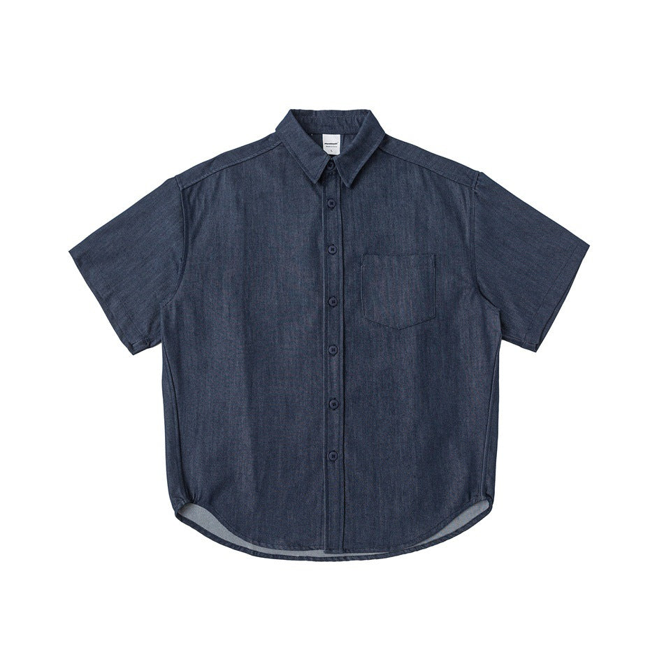 Blue denim-look short-sleeve button-up shirt with chest pocket and curved hem, flat lay front view
