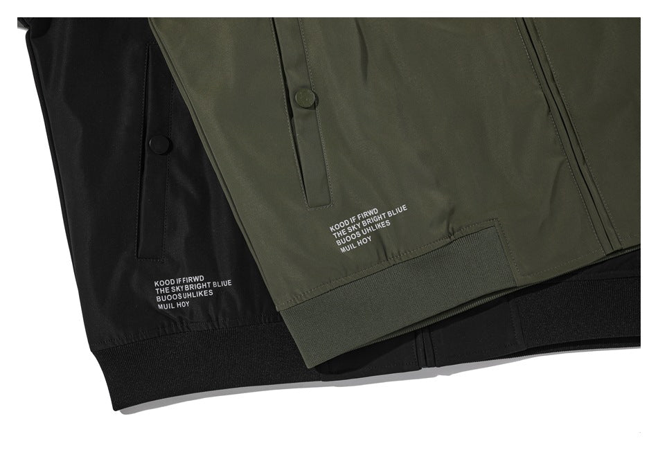 Olive and black jackets shown together, with snap plackets, ribbed hems, and small white text prints.