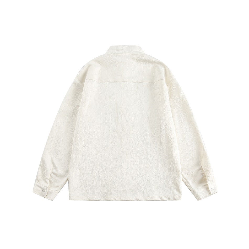 Back view of an ivory textured long-sleeve jacket with a stand collar and buttoned cuffs.