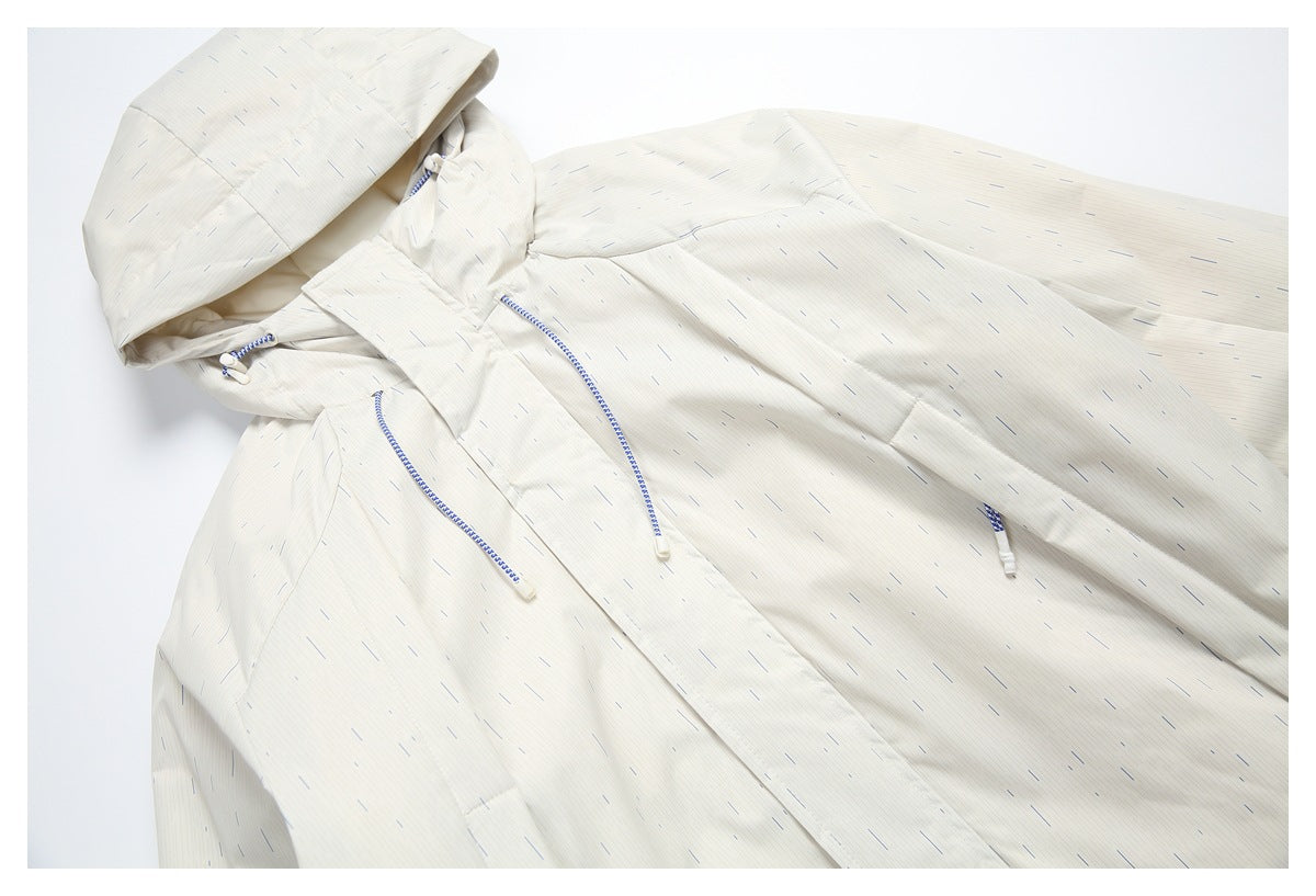 White hooded jacket with fine blue dash pattern laid diagonally, showing the front closure, drawcords, and sleeves.
