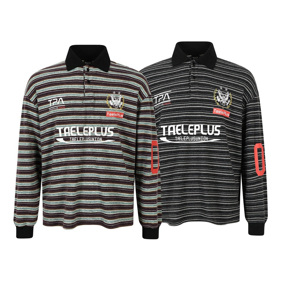 Two long-sleeve striped polo shirts with black collars and graphic prints, shown in teal-burgundy and black colorways.