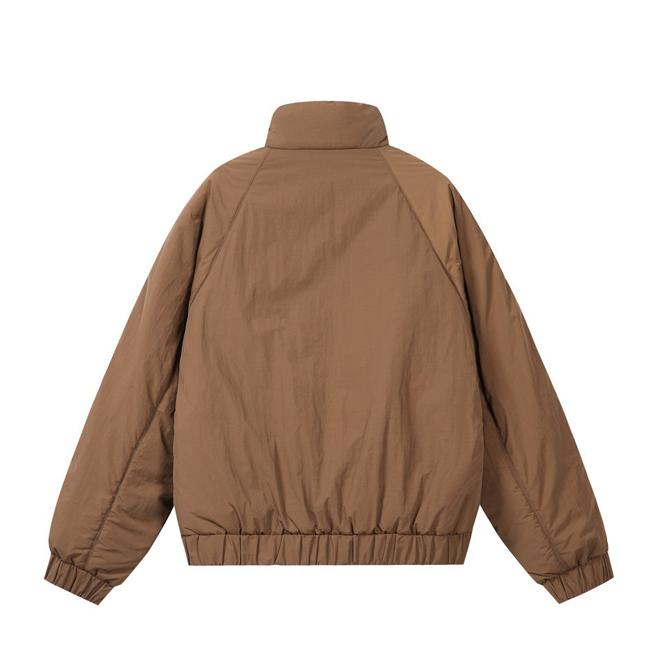 Back view of a brown high-collar jacket with raglan sleeves and gathered cuffs and hem.