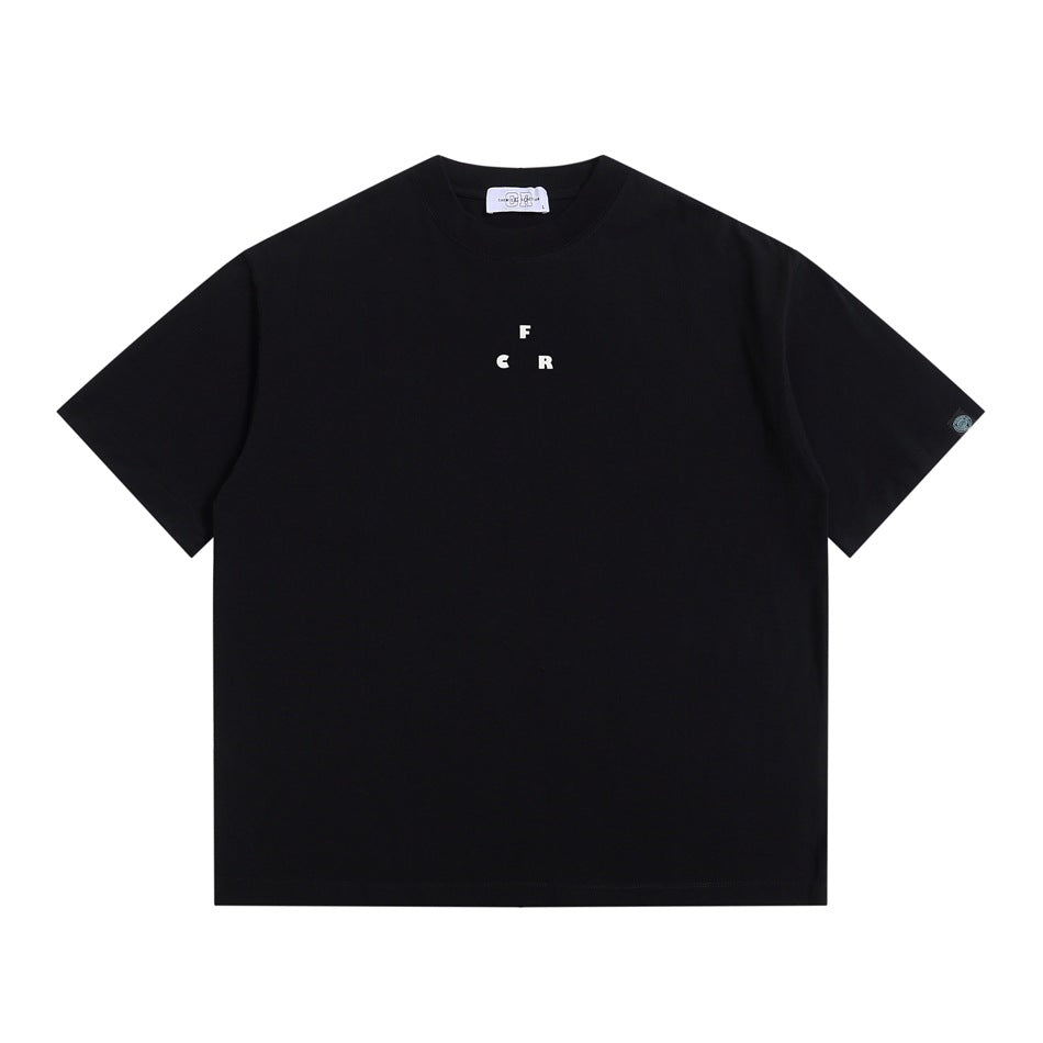 Black short-sleeve crew-neck t-shirt, flat front view, small white F C R letter print at center chest