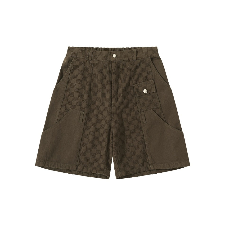 Brown knee-length shorts with checkerboard jacquard center panels, flap pocket and button closure, flat front view