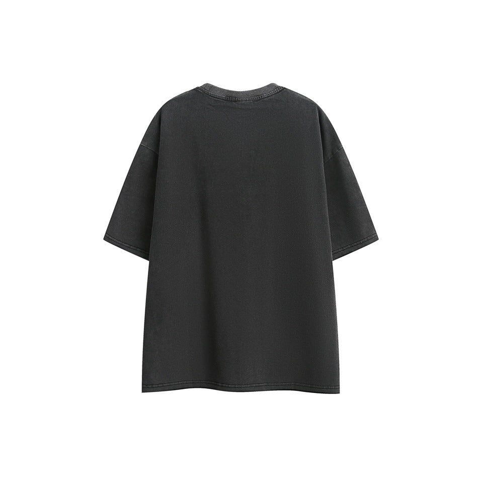 Back view of a plain charcoal-black T-shirt with a crew neck and short sleeves, laid flat on white.