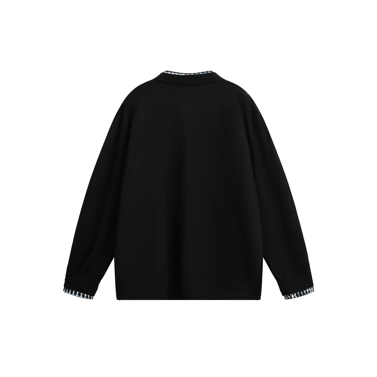 Back view of a black sweater with ribbed trim and black-and-white checked fabric peeking from the collar and cuffs.