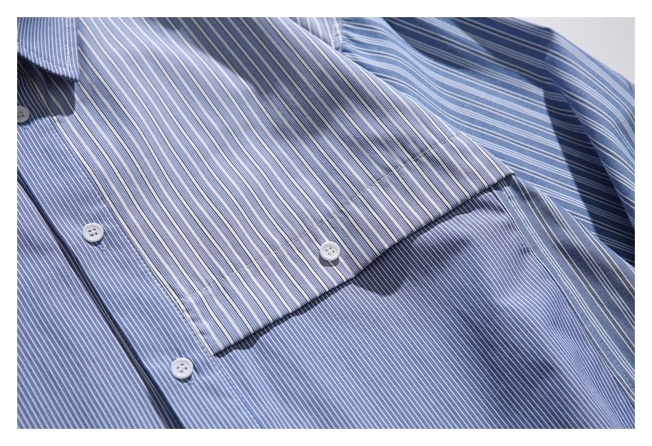 Close-up of the shirt's striped chest pocket, white buttons, and blue-and-white fabric.