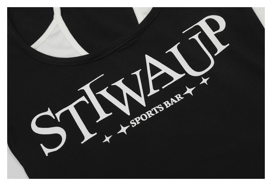 Close-up of a black top showing a large white serif chest print reading “STWAUP SPORTS BAR” with stars.