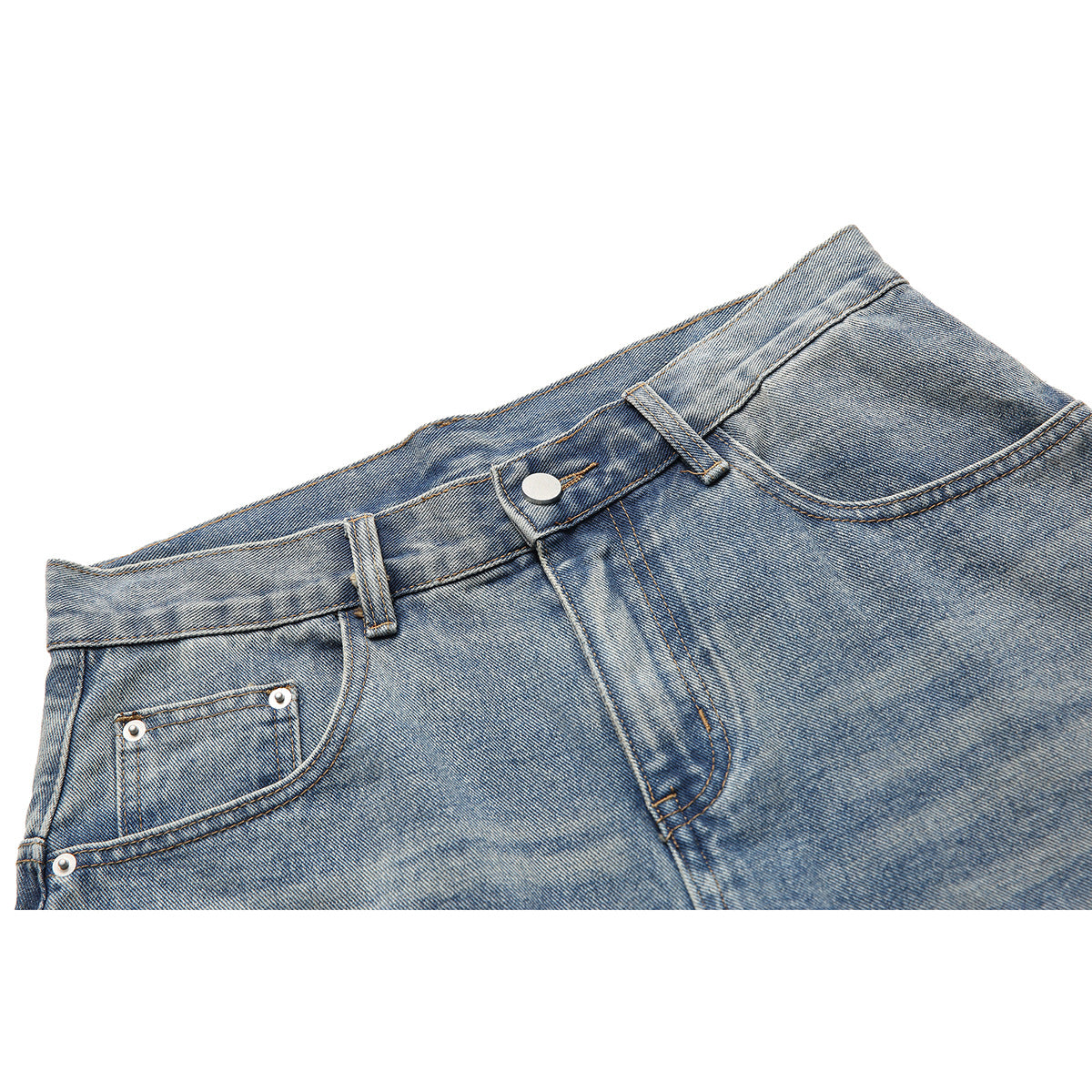 Close-up of light-wash blue jeans showing the front waistband, button, belt loops and pockets.