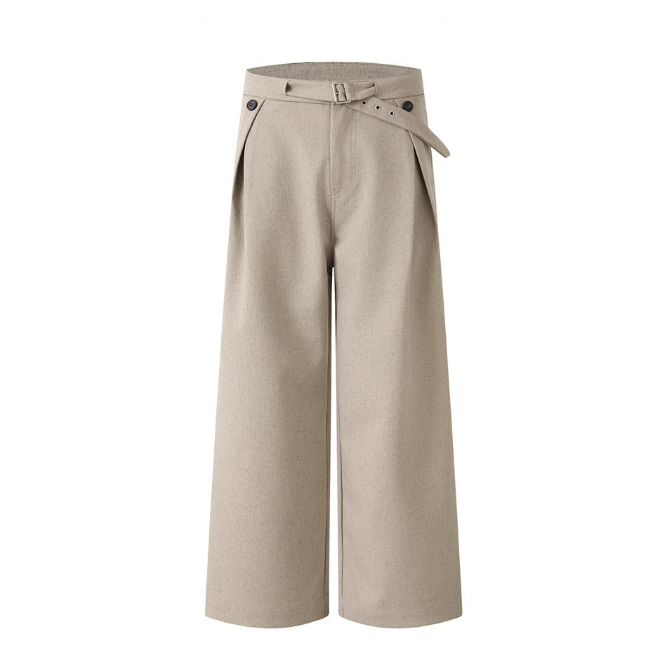 Khaki wide-leg trousers with pleated front, buckled belt strap and button details, flat front view