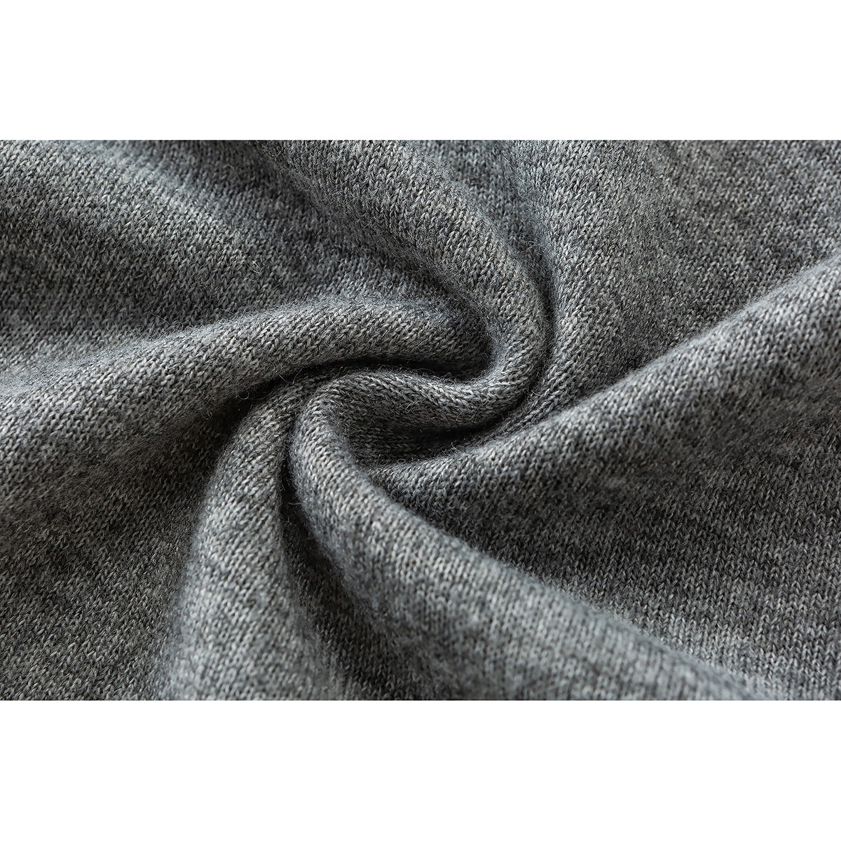 Close-up of heather gray knit fabric gathered into soft folds.