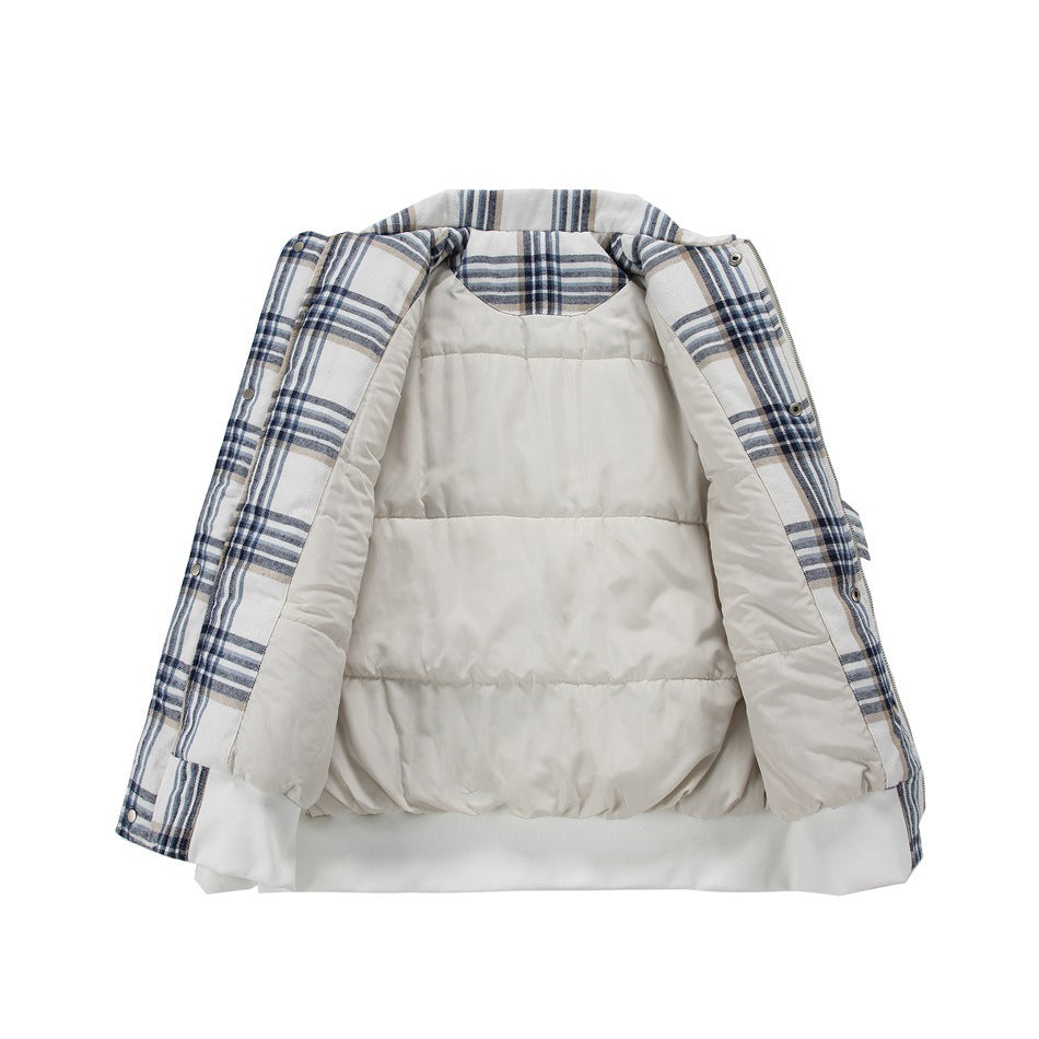 Open cream plaid jacket showing its light-colored quilted lining and snap-front edges.