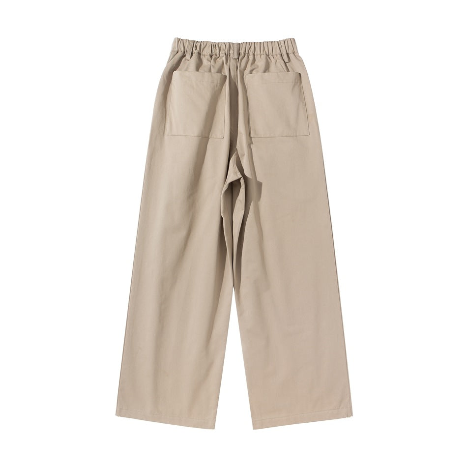 Full back view of taupe wide-leg trousers with an elastic waistband and two patch pockets.