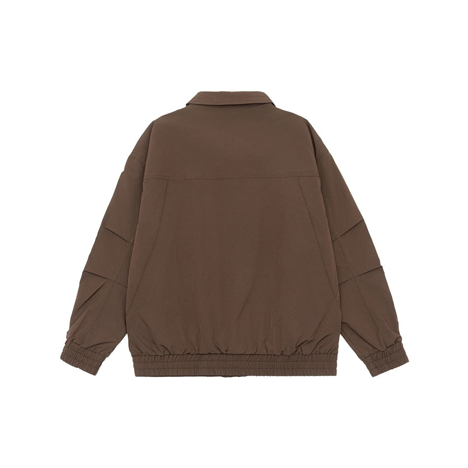 Back view of a brown collared jacket with long sleeves, seam detailing, and elastic cuffs and hem on white.
