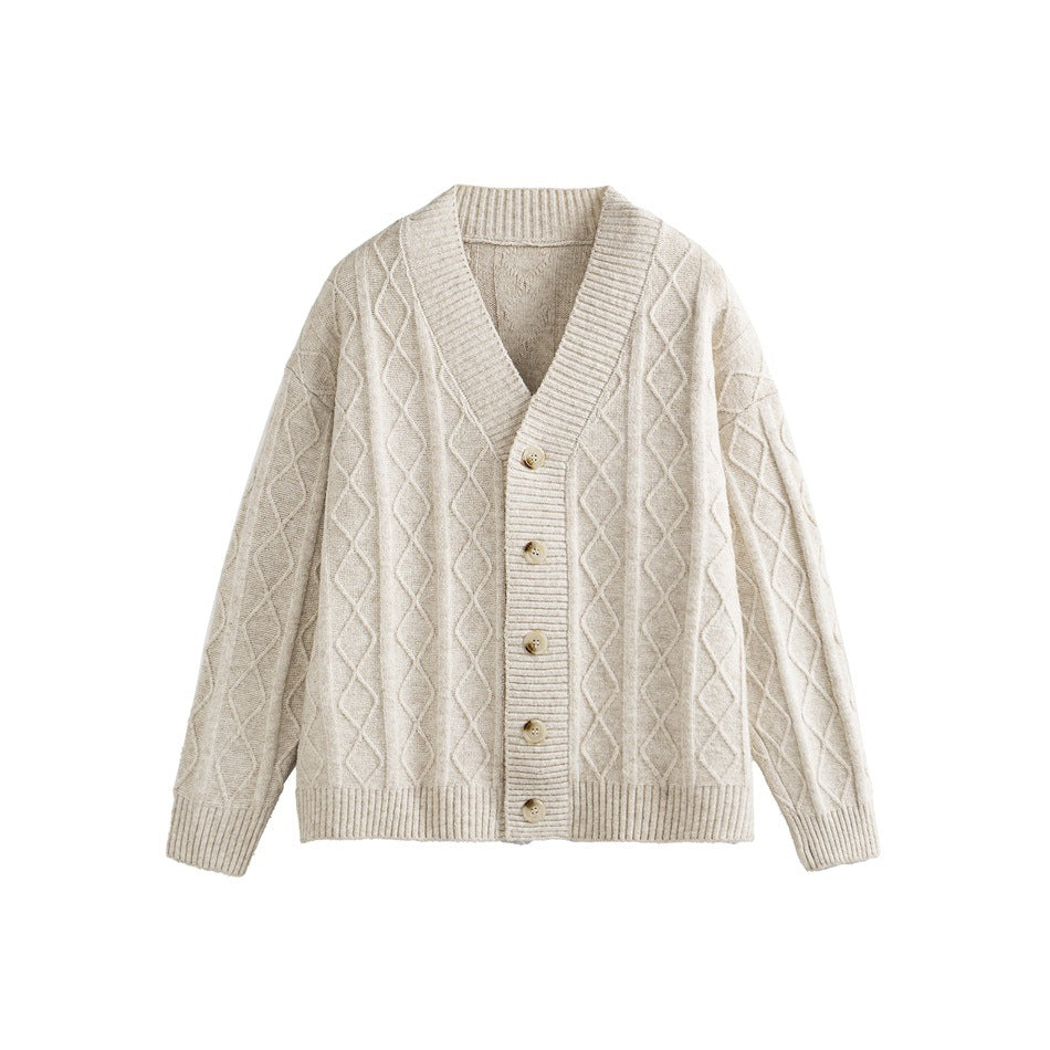 Apricot V-neck button-front cardigan with diamond cable-knit texture and ribbed trim, flat lay