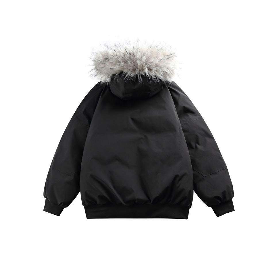 Back view of a black hooded puffer jacket with gray fur trim and ribbed cuffs and hem.