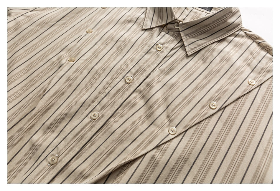 Close-up of a cream striped shirt's front buttons and overlapping button placket.