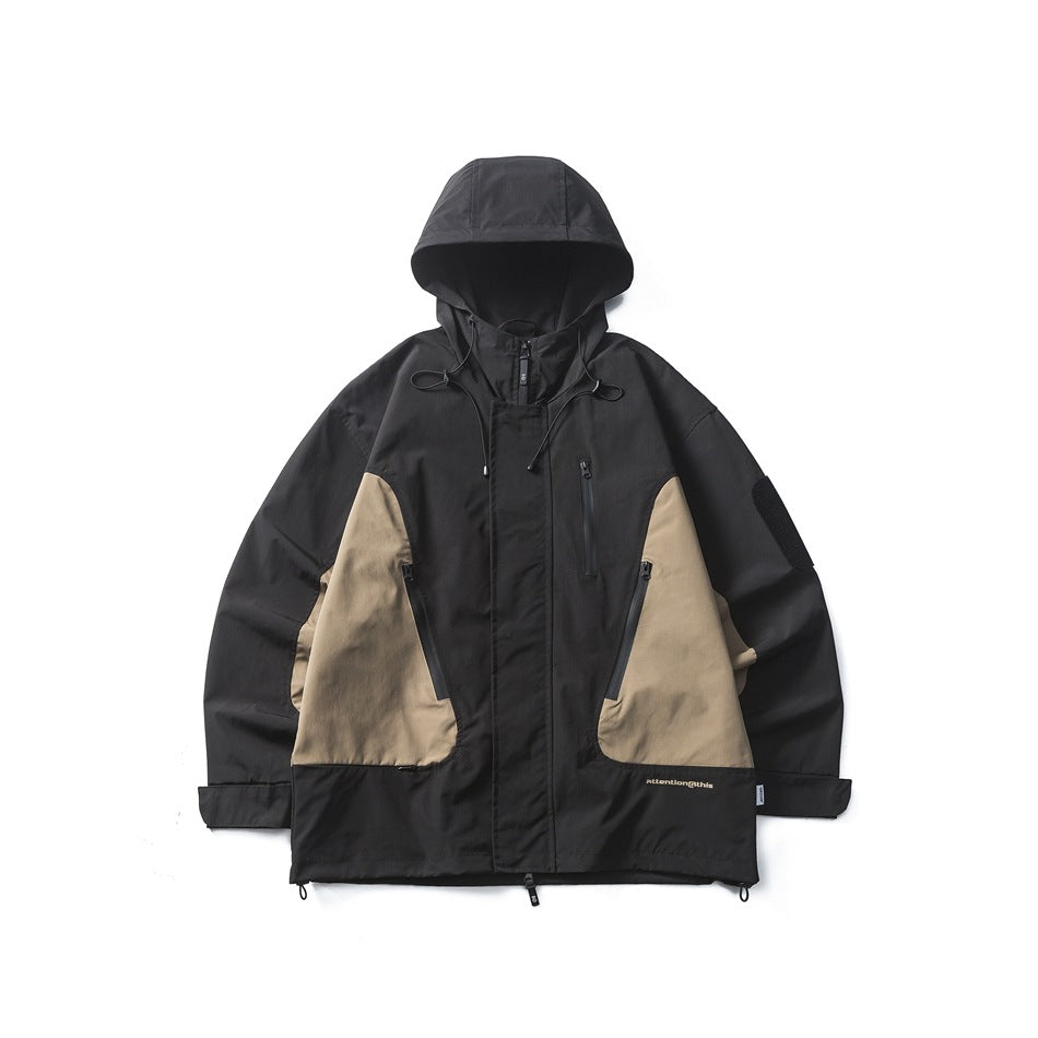 Black hooded jacket displayed from the front, with tan side panels, zip pockets, and a front zipper.