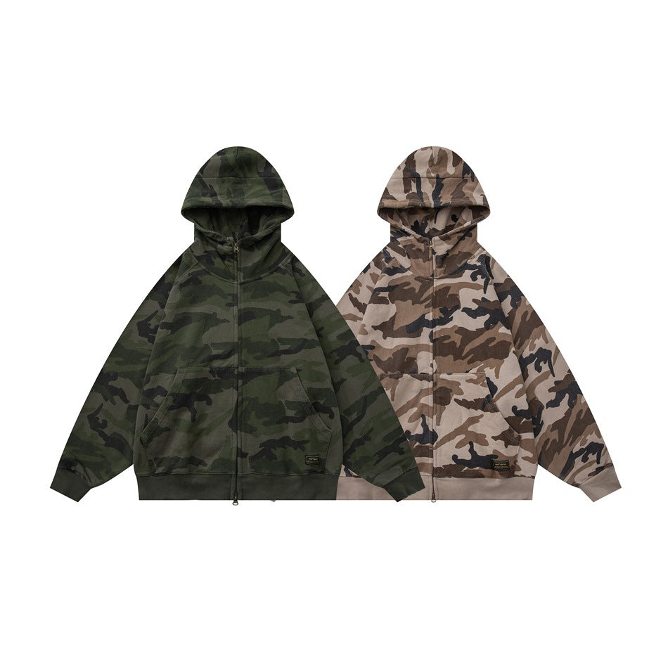 Two front views of zip-up hoodies with kangaroo pockets: one dark green camouflage and one tan camouflage.