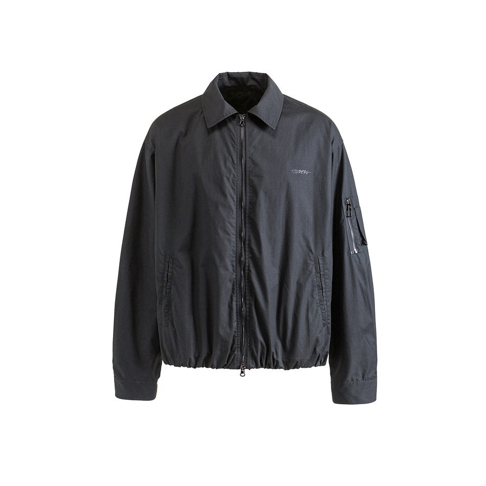 Dark gray collared zip-front jacket flat lay with sleeve zip pocket, side pockets and gathered hem