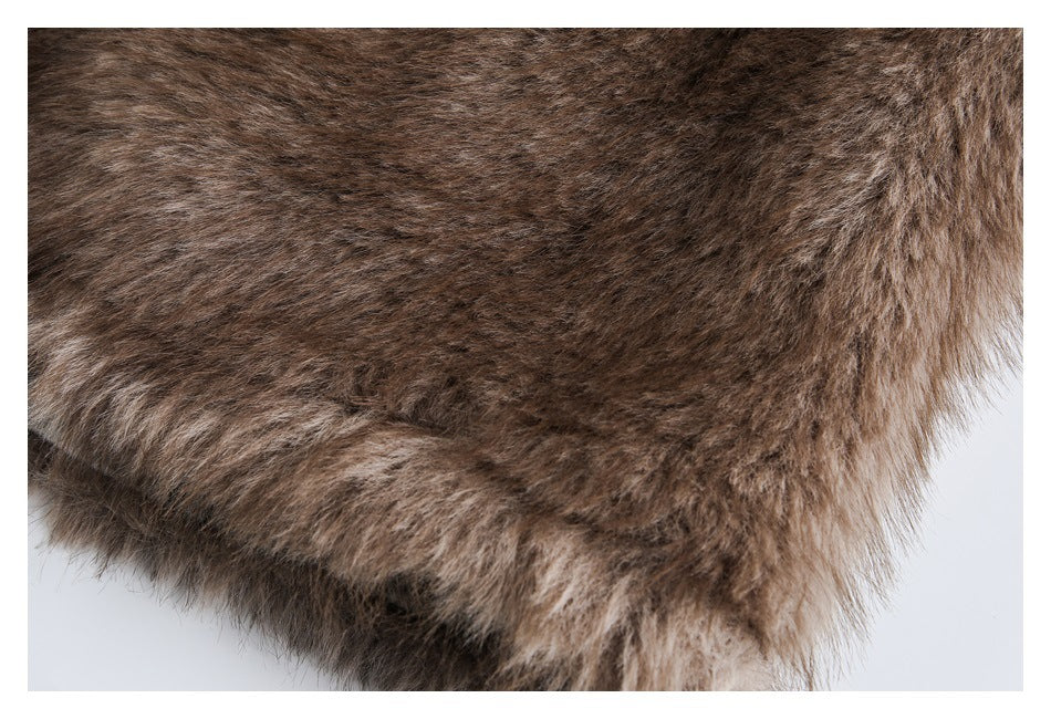 Close-up of thick brown and taupe faux-fur trim on a coat against a white background.