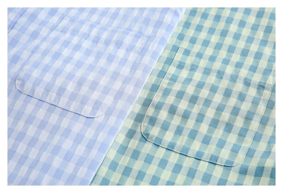 Close-up of the patch pockets on light blue gingham and teal-and-yellow gingham shirts.