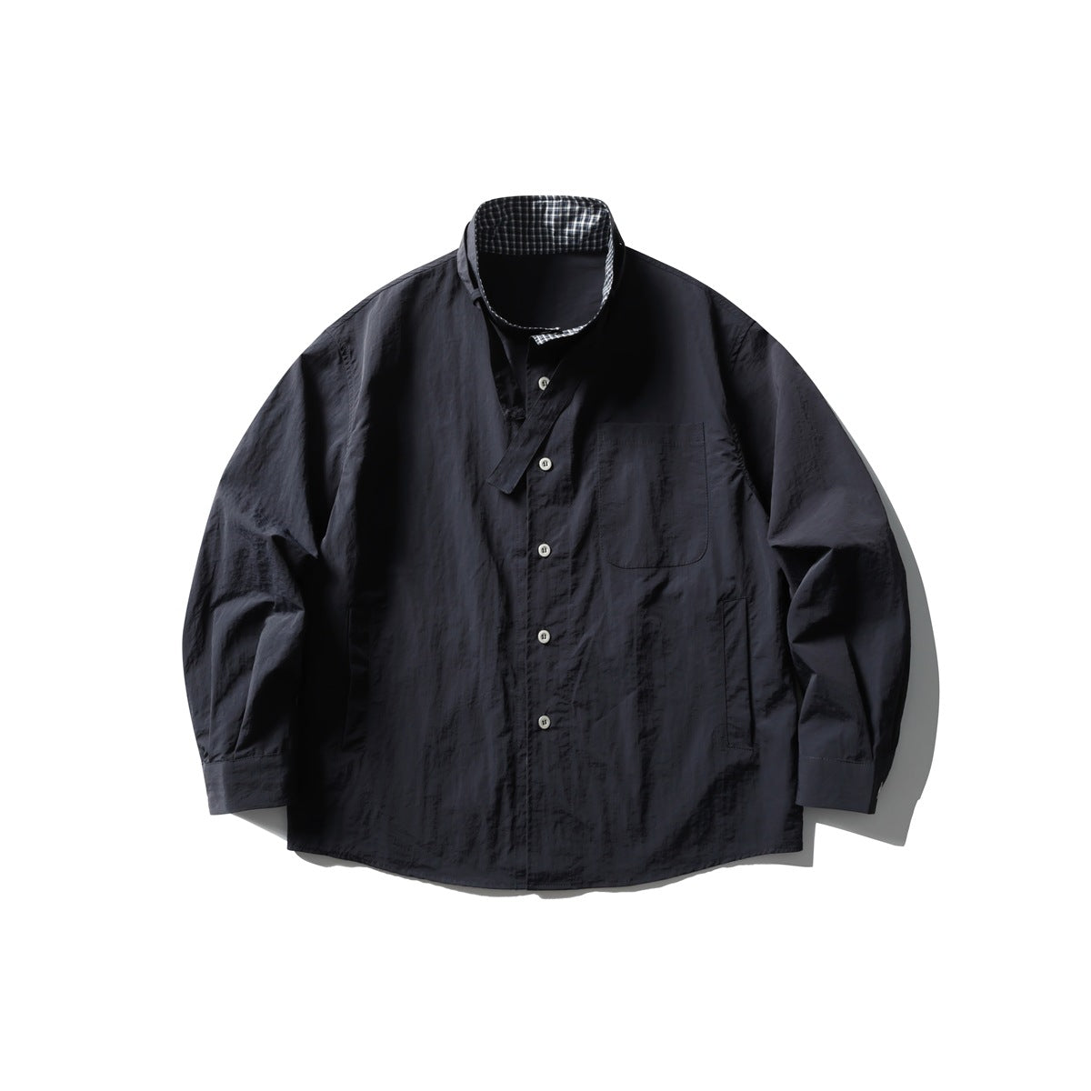 Navy shirt-style jacket flat lay with stand collar, check inner collar, button front and chest pocket