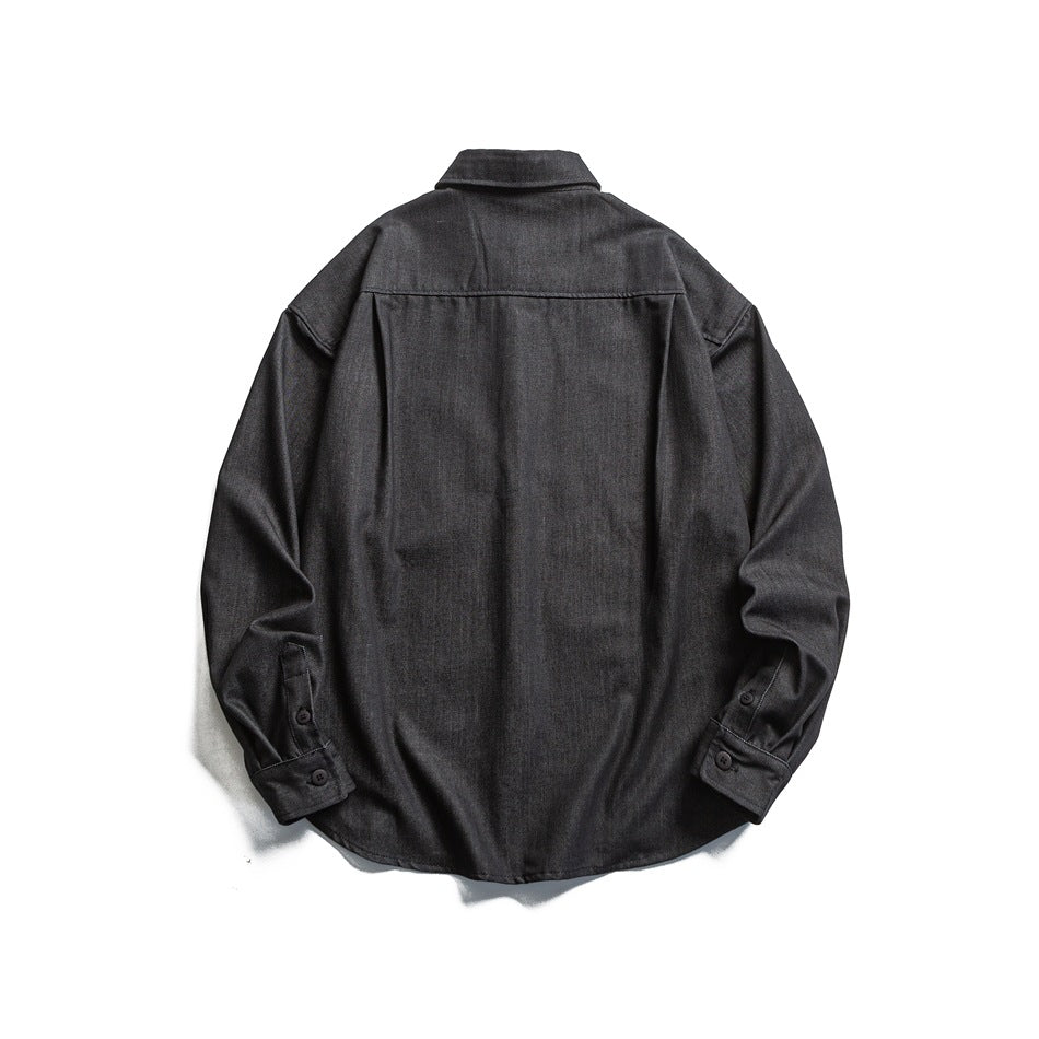 Back view of a dark charcoal button-up shirt with a pointed collar, shoulder yoke, and button cuffs.
