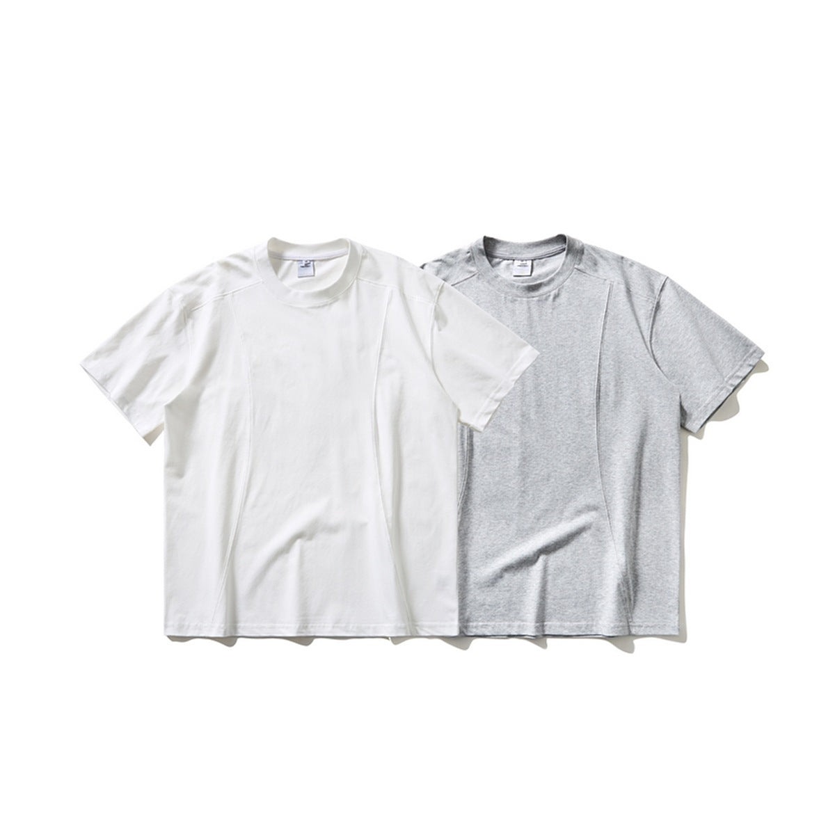 White and light gray short-sleeve crew-neck T-shirts shown from the front.
