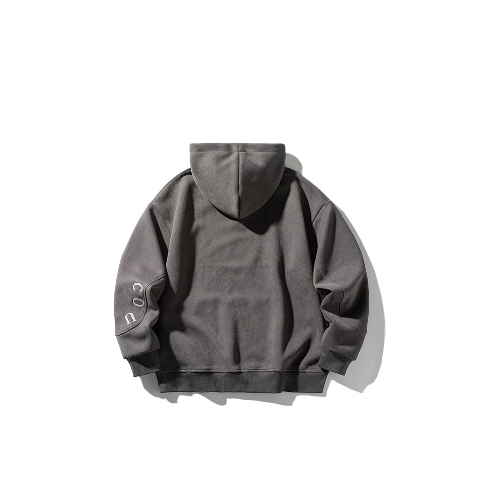 Back view of a charcoal gray hooded sweatshirt with white lettering on one sleeve.