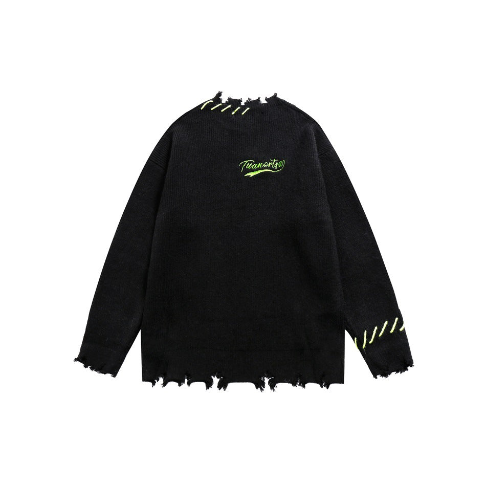 Back of a black ribbed sweater with distressed edges, neon yellow-green stitching and a small embroidered script logo.
