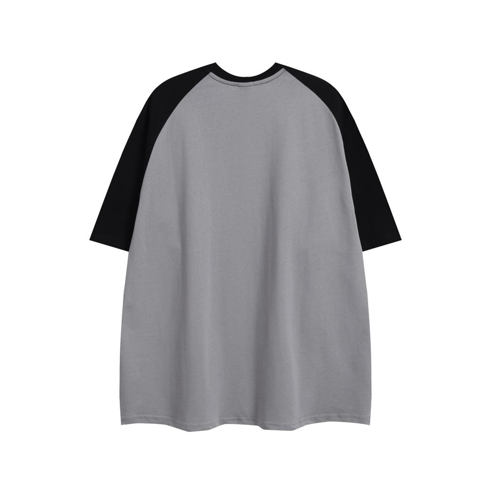 Back view of a plain gray raglan T-shirt with black sleeves.
