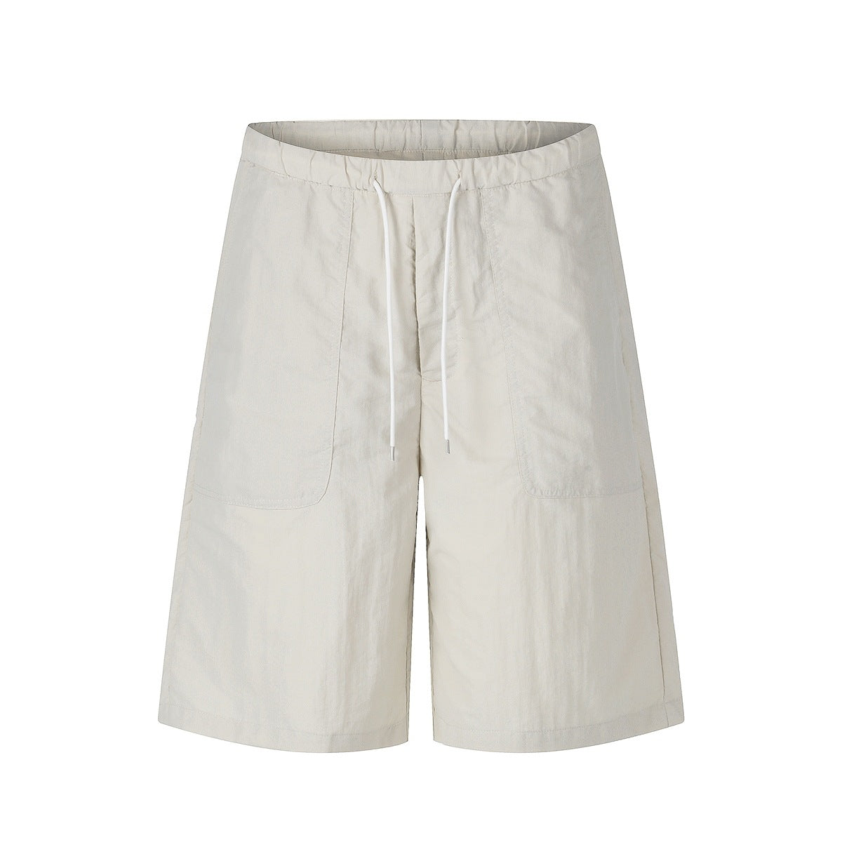 Beige knee-length shorts with elastic waist, white drawstring and large front patch pockets, front view