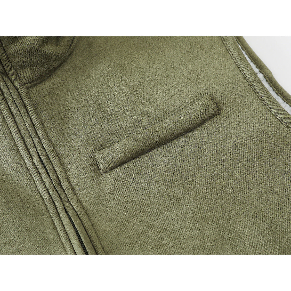 Close-up of an olive-green vest showing a narrow chest welt pocket and front zipper.