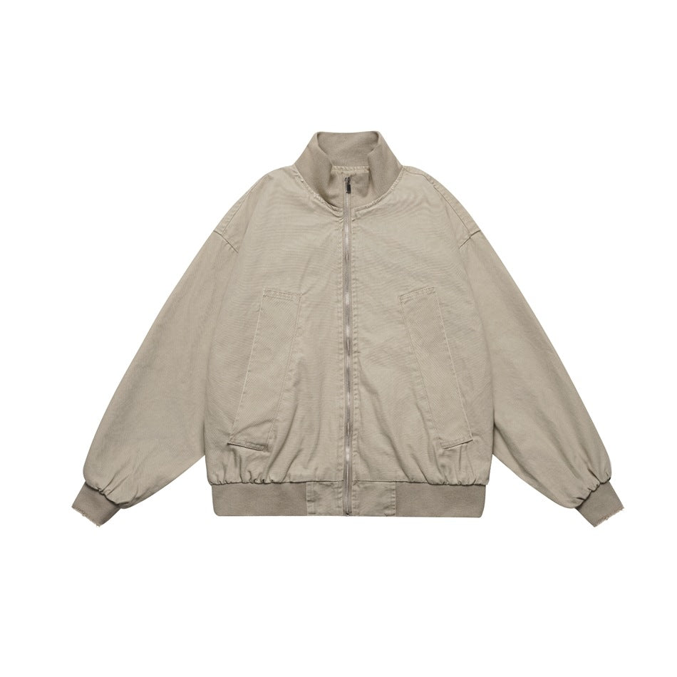 Grey khaki stand-collar zip jacket with ribbed trim, angled front pockets and gathered cuffs, flat front view