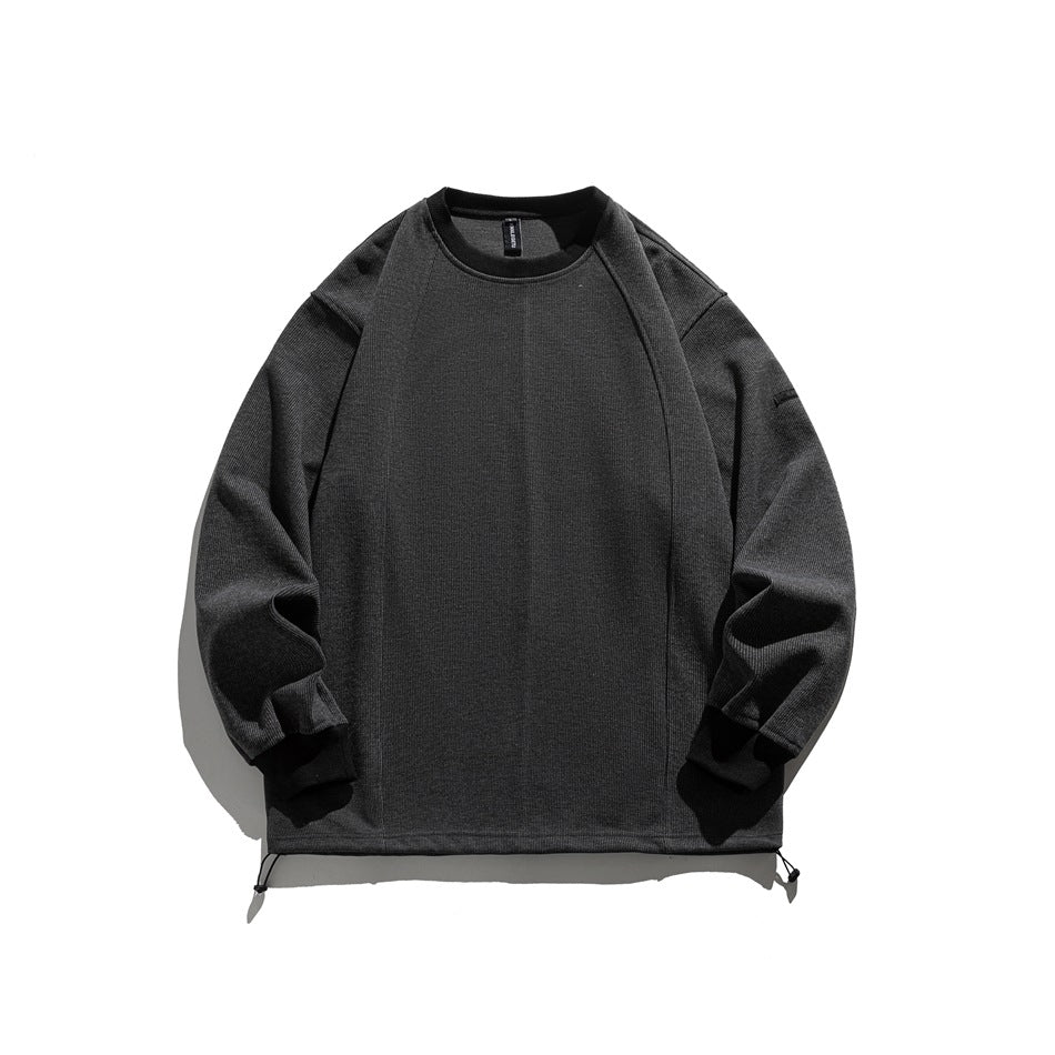 Gray crew-neck ribbed sweatshirt flat lay with raglan seams, black trim and hem drawcord toggles
