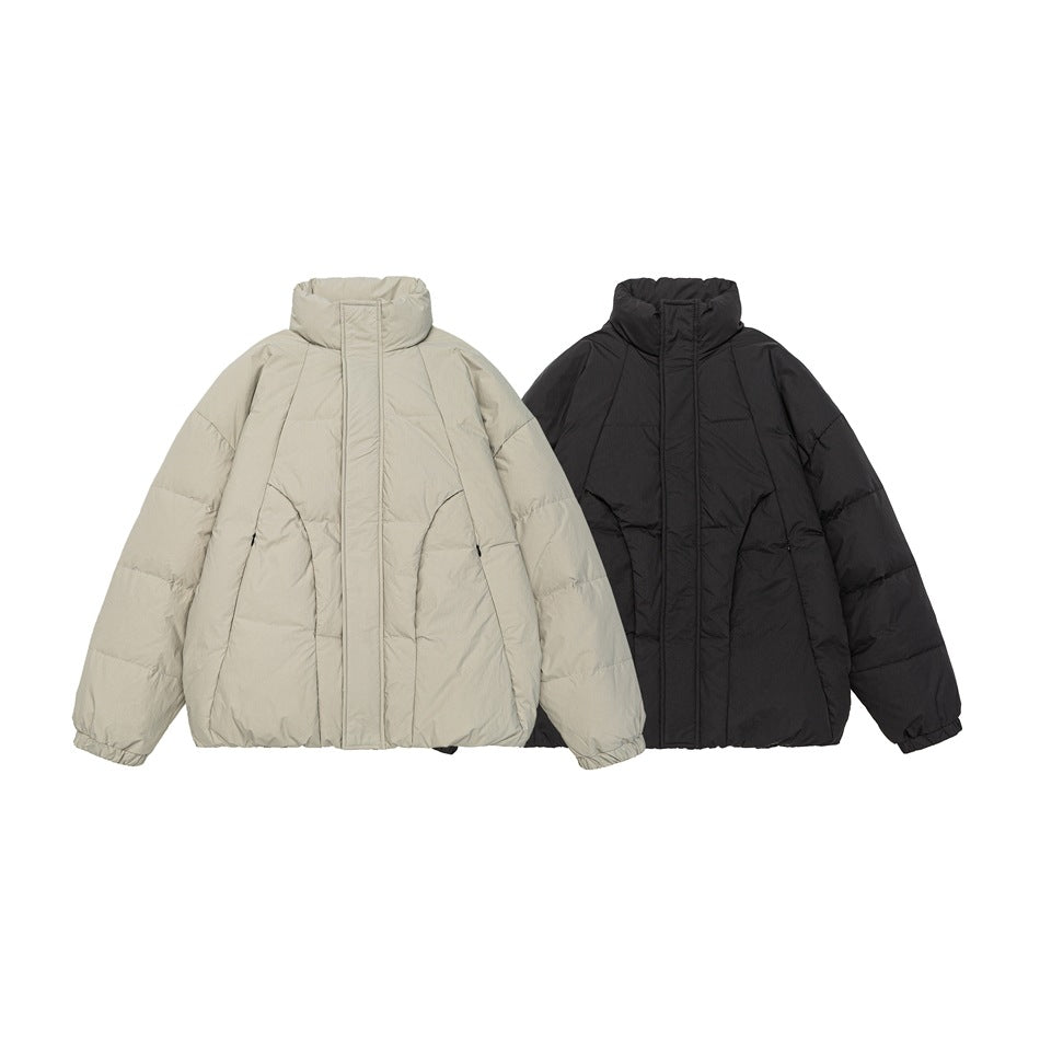 Two padded jackets displayed side by side: one light beige and one black, both with high collars.