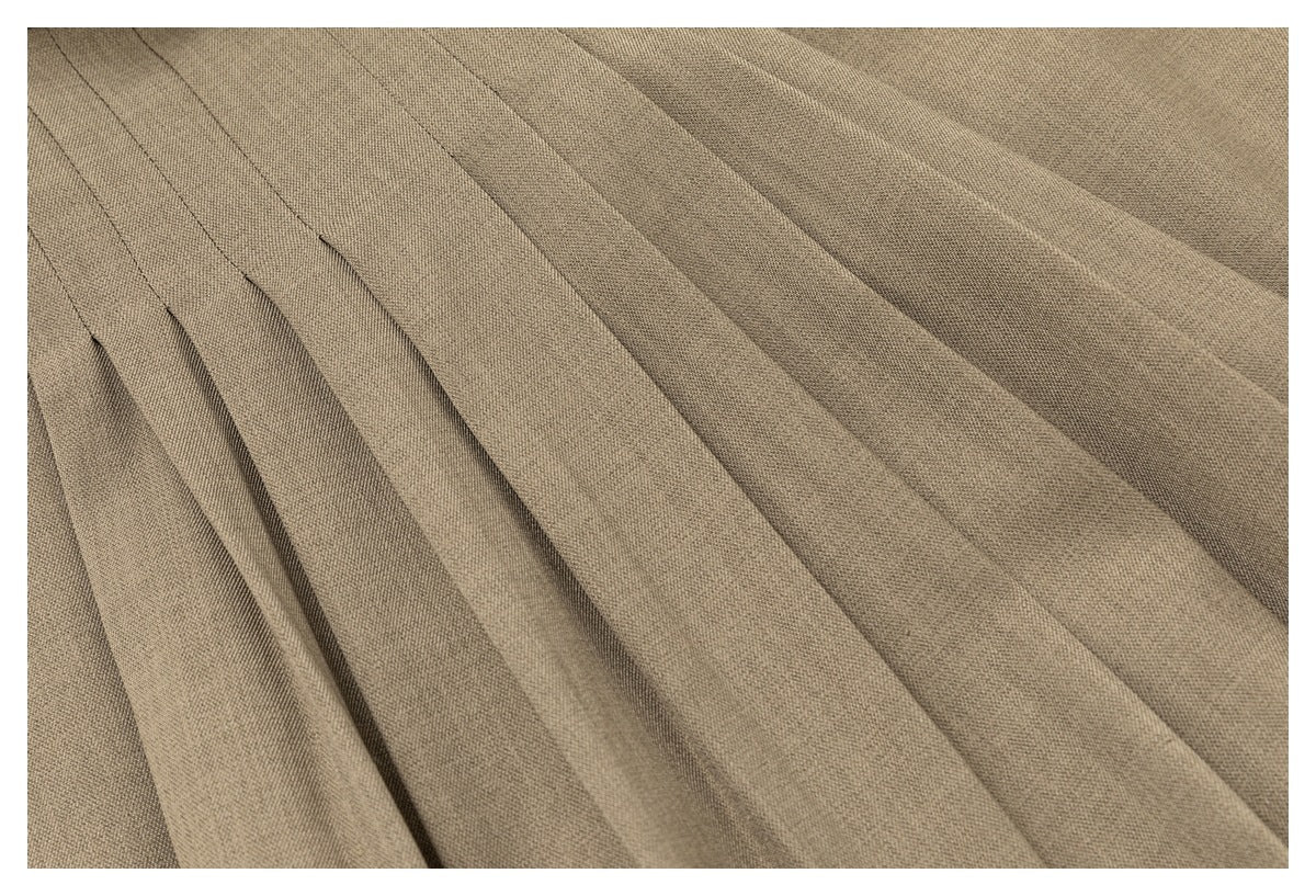 Close-up of taupe fabric arranged in soft parallel folds.