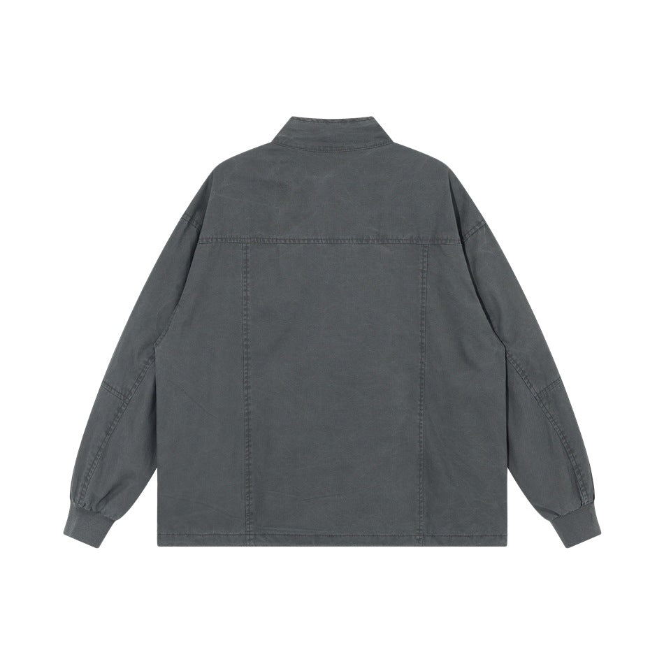 Back view of a charcoal gray jacket with a stand collar, long sleeves, ribbed cuffs, and a straight hem.
