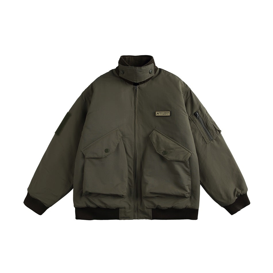 Olive green zip-front jacket with stand collar, two large flap pockets and brown ribbed cuffs, flat front view