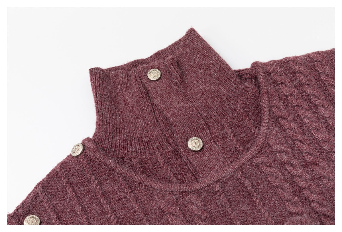 Close-up of the sweater's burgundy ribbed neckline, textured knit, and decorative buttons.
