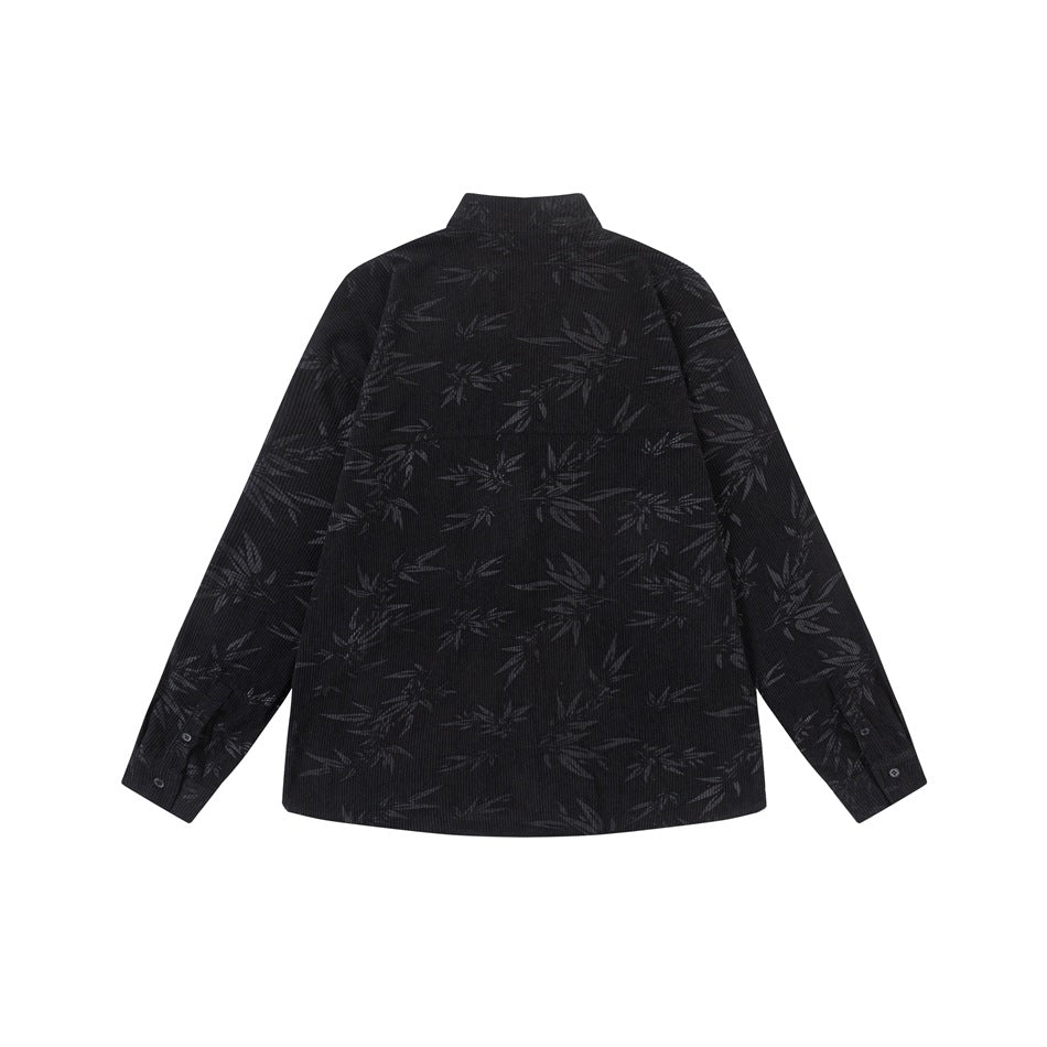 Back view of a black long-sleeved jacket with a subtle bamboo-leaf pattern and stand collar.