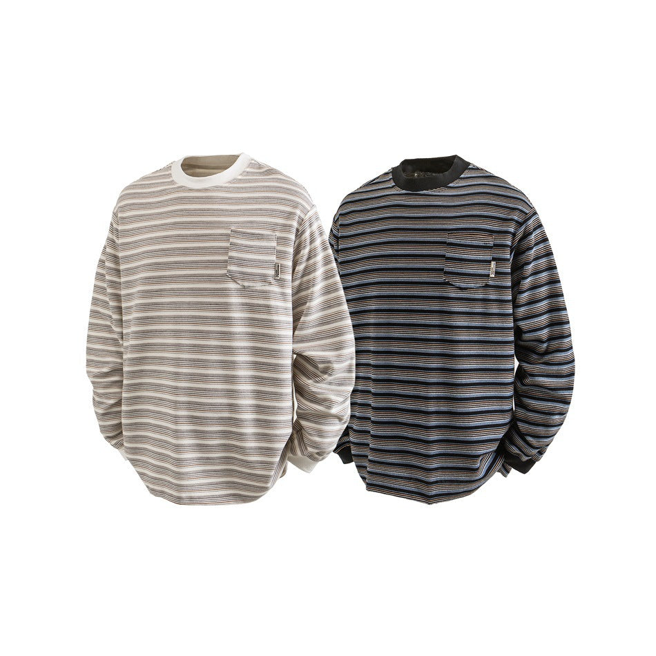 Two long-sleeve crewneck tops with chest pockets, shown in cream and black colorways with fine horizontal stripes.